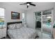 Bedroom with pool view, sliding door, and modern decor at 15308 Acorn Cir, Port Charlotte, FL 33981