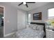 Light and airy bedroom with double doors and neutral decor at 15308 Acorn Cir, Port Charlotte, FL 33981