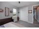 Bedroom with sliding barn doors and neutral decor at 15308 Acorn Cir, Port Charlotte, FL 33981