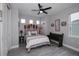 Bedroom with unique headboard and neutral decor at 15308 Acorn Cir, Port Charlotte, FL 33981