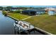 Private boat dock with lift and spacious backyard at 15308 Acorn Cir, Port Charlotte, FL 33981