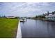 Scenic view of the canal with private docks and homes at 15308 Acorn Cir, Port Charlotte, FL 33981