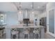 Modern kitchen with granite island, stainless steel appliances, and ample cabinet space at 15308 Acorn Cir, Port Charlotte, FL 33981
