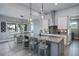 Open concept kitchen with large island and breakfast nook at 15308 Acorn Cir, Port Charlotte, FL 33981