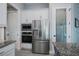 Modern kitchen with stainless steel appliances and granite countertops at 15308 Acorn Cir, Port Charlotte, FL 33981