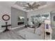 Spacious living room with sectional sofa and fireplace at 15308 Acorn Cir, Port Charlotte, FL 33981