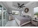 Main bedroom with water views and sliding doors to the pool area at 15308 Acorn Cir, Port Charlotte, FL 33981
