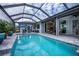 Relaxing pool and lanai with seating area at 15308 Acorn Cir, Port Charlotte, FL 33981