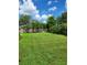 Expansive grassy backyard, perfect for outdoor activities at 158 Concord Ne Dr, Port Charlotte, FL 33952