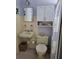 Updated bathroom with light yellow tile and white cabinets at 158 Concord Ne Dr, Port Charlotte, FL 33952