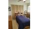 Bright bedroom with a double bed and window coverings at 158 Concord Ne Dr, Port Charlotte, FL 33952