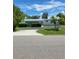 Charming single story home with a spacious lawn and driveway at 158 Concord Ne Dr, Port Charlotte, FL 33952