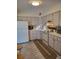 Bright kitchen featuring white cabinets and modern appliances at 158 Concord Ne Dr, Port Charlotte, FL 33952