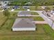 Aerial view of houses in a residential neighborhood at 16039 Quinta Dr, Punta Gorda, FL 33955