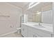 Clean bathroom with white vanity, toilet and shower at 16039 Quinta Dr, Punta Gorda, FL 33955