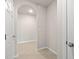 Bright hallway with neutral walls and tile flooring at 16039 Quinta Dr, Punta Gorda, FL 33955