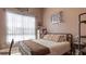 Spacious bedroom with ample natural light and a window view at 17220 Horizon Ln, Port Charlotte, FL 33948