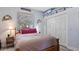 Charming bedroom with a double bed and built-in closet at 17220 Horizon Ln, Port Charlotte, FL 33948