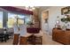 Cozy dining area with wooden table and chairs near a window at 17220 Horizon Ln, Port Charlotte, FL 33948