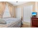 Bright bedroom with double closets and a view at 1906 Creek Nine Dr, North Port, FL 34291