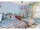 Comfortable bedroom with twin and full beds, providing ample space at 1906 Creek Nine Dr, North Port, FL 34291