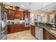 Modern kitchen with stainless steel appliances and ample cabinetry at 1906 Creek Nine Dr, North Port, FL 34291