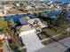 Aerial view of waterfront home with a large driveway at 193 Beeney Se Rd, Port Charlotte, FL 33952