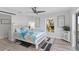 Bedroom with a queen bed and coastal decor at 193 Beeney Se Rd, Port Charlotte, FL 33952