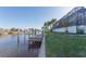 Private wooden dock with boat lift for easy water access at 193 Beeney Se Rd, Port Charlotte, FL 33952