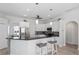 Modern kitchen with island and stainless steel appliances at 193 Beeney Se Rd, Port Charlotte, FL 33952