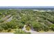 Aerial view of community, showing lush landscaping and building exteriors at 19505 Quesada Ave # Rr203, Port Charlotte, FL 33948