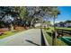 Bocce ball court with benches under shade trees at 19505 Quesada Ave # Rr203, Port Charlotte, FL 33948