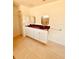 Double vanity bathroom with a burgundy countertop at 2057 Wonderwin St, Port Charlotte, FL 33948