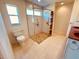 Updated bathroom featuring a walk-in shower and double vanity at 2057 Wonderwin St, Port Charlotte, FL 33948