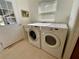 Laundry room featuring a washer and dryer at 2057 Wonderwin St, Port Charlotte, FL 33948