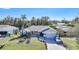 Single-Gathering home with driveway and landscaped yard at 21241 Winside Ave, Port Charlotte, FL 33952