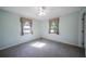 Bright bedroom with carpet flooring and ceiling fan at 21241 Winside Ave, Port Charlotte, FL 33952