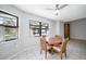 Bright breakfast nook with table and chairs near the pool at 21241 Winside Ave, Port Charlotte, FL 33952