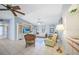 Relaxing living room with vaulted ceiling and lots of natural light at 21241 Winside Ave, Port Charlotte, FL 33952