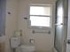 Bathroom with shower and toilet, ready for renovation at 2171 Bayou Rd, Punta Gorda, FL 33950