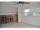 Undergoing renovation, this bedroom features a ceiling fan at 2171 Bayou Rd, Punta Gorda, FL 33950