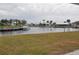 Relaxing canal view with boat and dock at 2171 Bayou Rd, Punta Gorda, FL 33950