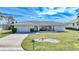 Ranch-style home with a neatly landscaped front yard at 2171 Bayou Rd, Punta Gorda, FL 33950