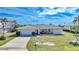 Single story home with attached garage and well maintained yard at 2171 Bayou Rd, Punta Gorda, FL 33950