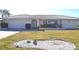 Front view of house with landscaping at 2171 Bayou Rd, Punta Gorda, FL 33950