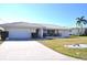 Front view of house with landscaping at 2171 Bayou Rd, Punta Gorda, FL 33950