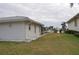 House side view with canal view at 2171 Bayou Rd, Punta Gorda, FL 33950