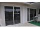 Sliding glass doors leading to a patio with seating area at 2171 Bayou Rd, Punta Gorda, FL 33950