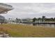 Waterfront view from backyard with lush greenery at 2171 Bayou Rd, Punta Gorda, FL 33950