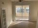 Bright sunroom with tile flooring and sliding glass doors at 21921 Beverly Ave, Port Charlotte, FL 33952